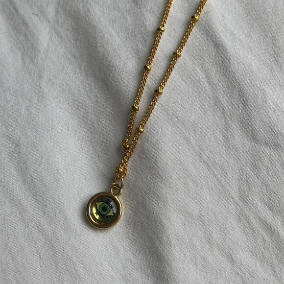 eye candy Jewelry - Gold eye necklace with green
